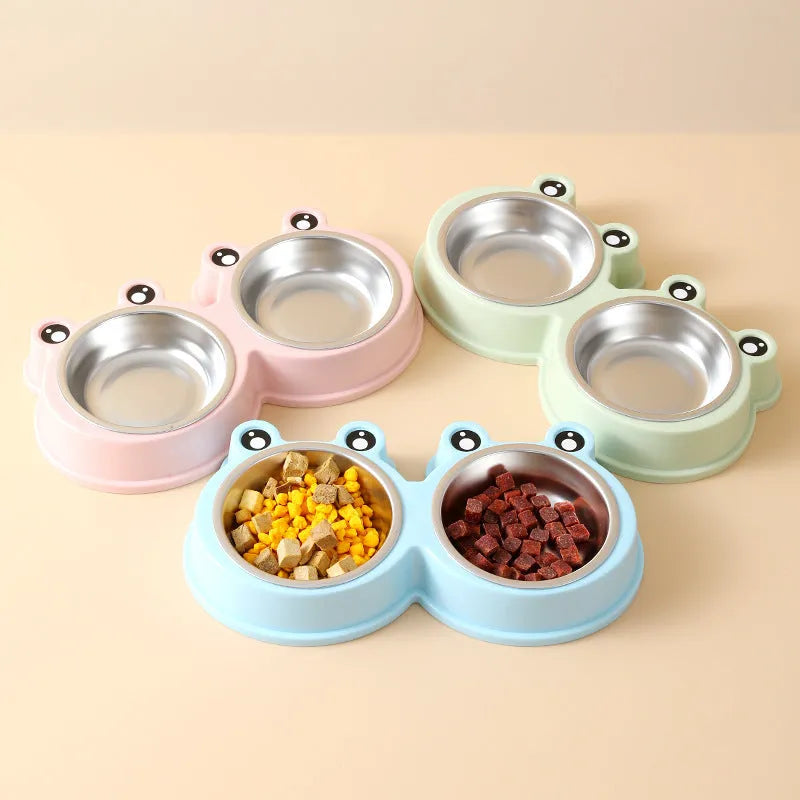 Stainless steel pet bowl with ceramic frog base and dual food water compartments