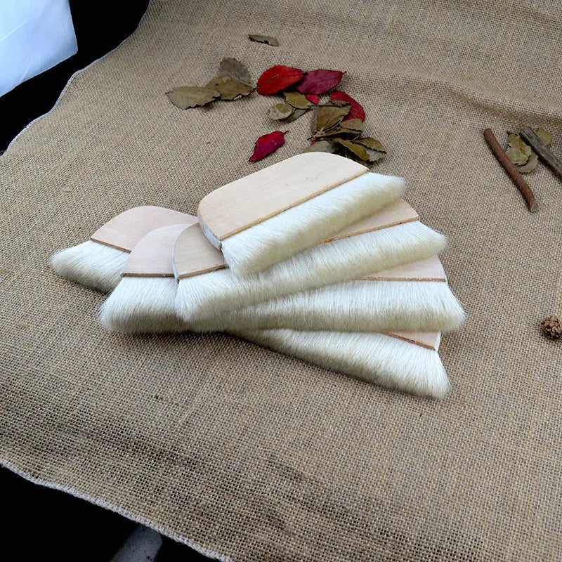 Wool brush for art mounting and paste application in four available sizes