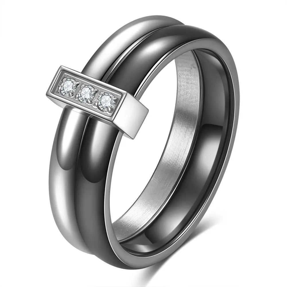 Ceramic women's ring with 6mm band width and inlaid zirconium accents in geometric round design