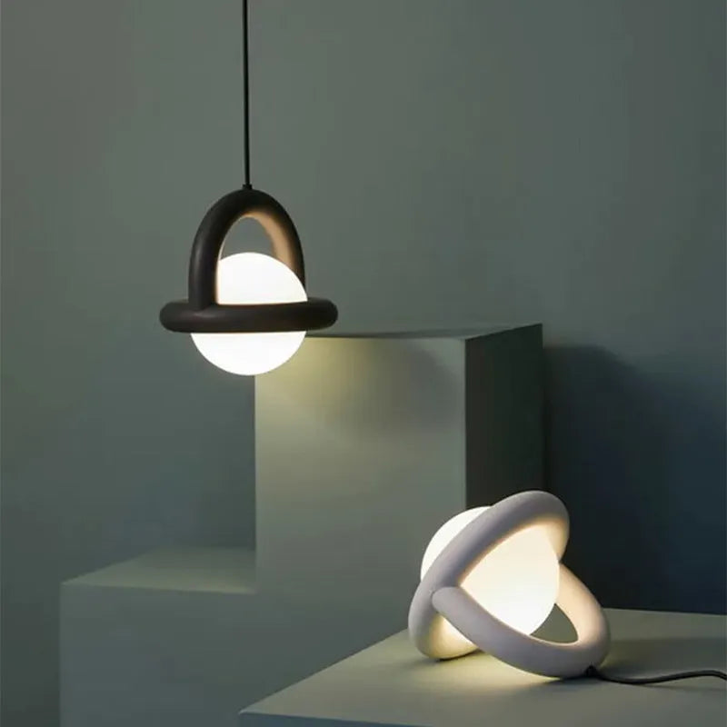 Danish designer hanging pendant lamp in matte finish with adjustable cord for bedroom or living room.
