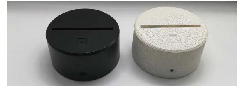 3D rose design night light on a black base showing multicolour gradient illumination.
