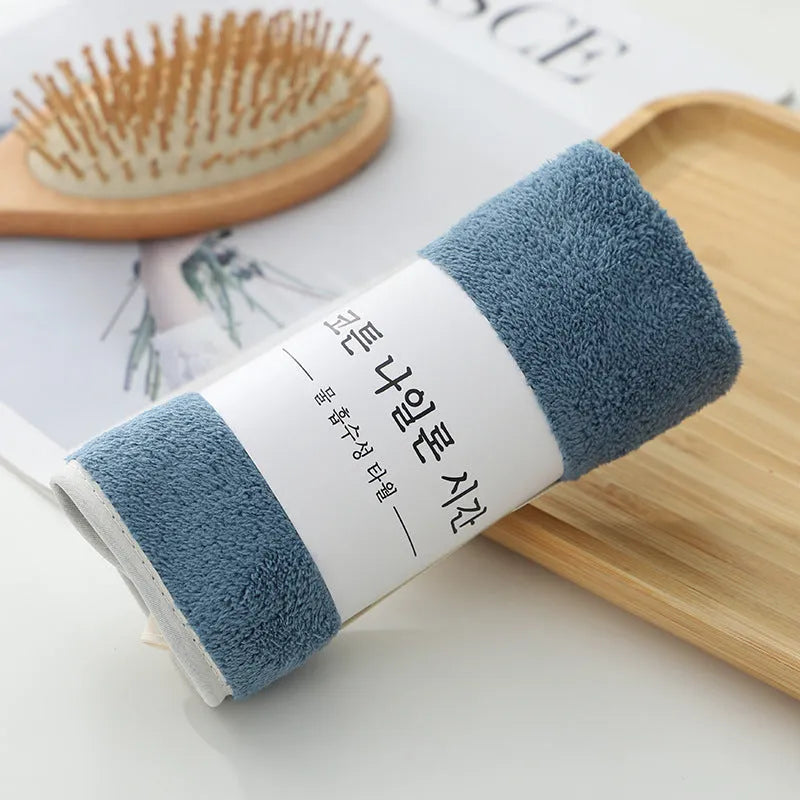 Thickened high density coral fleece face towel 30x60cm with plain weave and edging, shown in available colours for face washing
