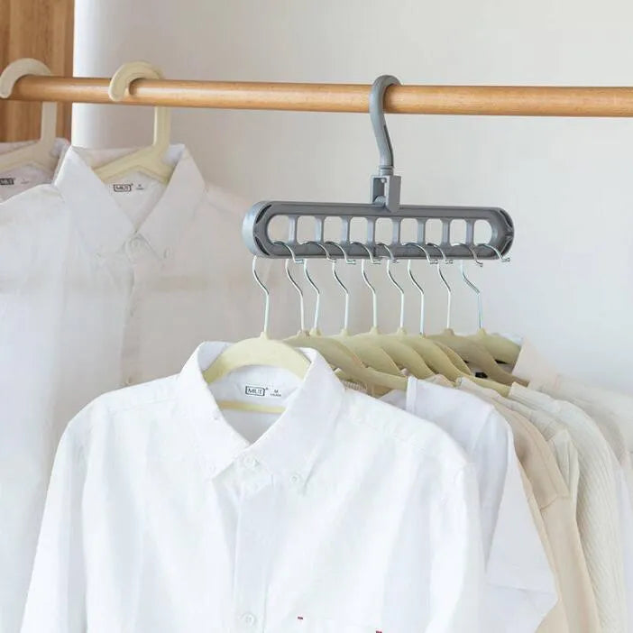 Plastic clothes hanger with storage hook and rotating handle in available colours