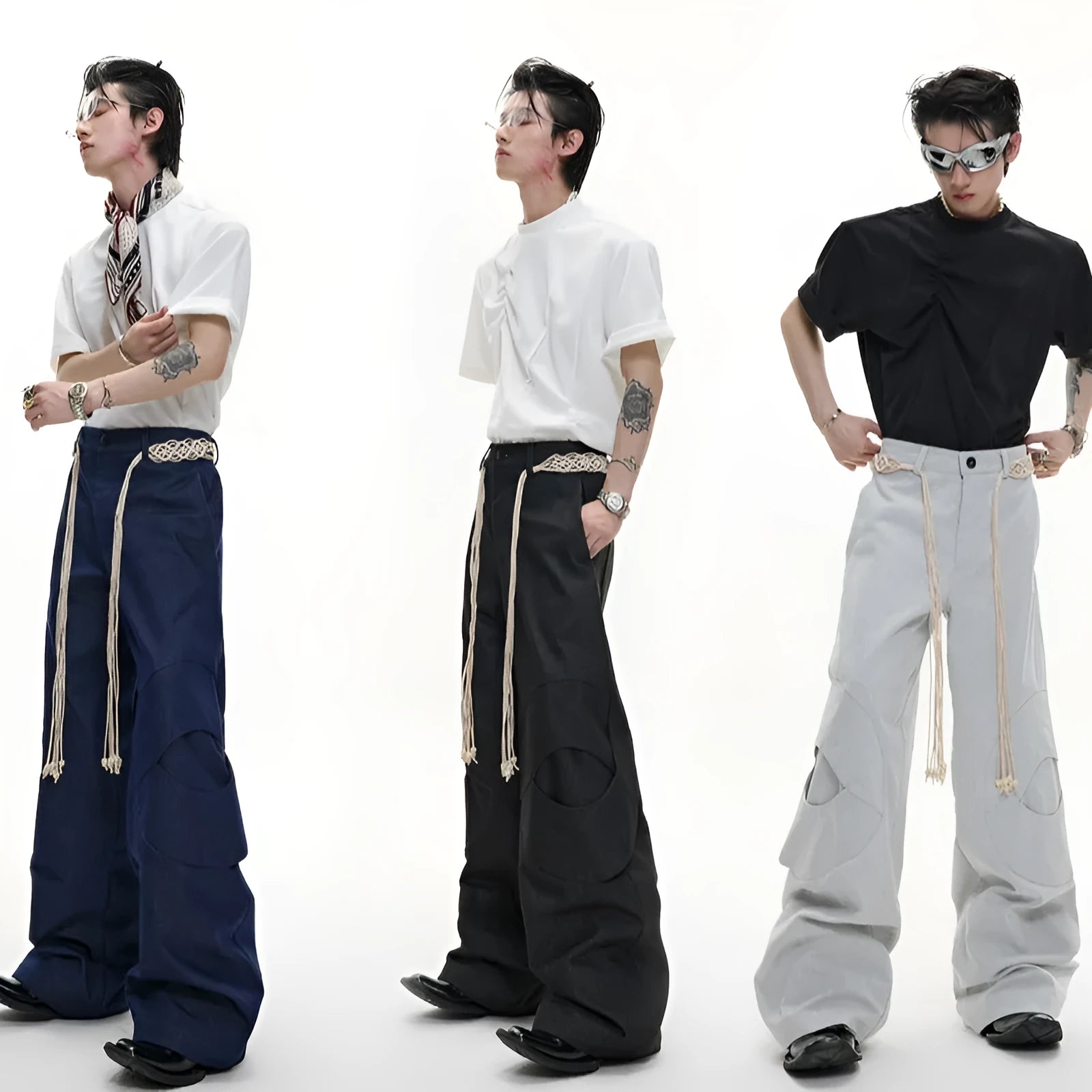 Men's dark blue loose fit straight leg jeans with zipper decoration and belt stitching detail.