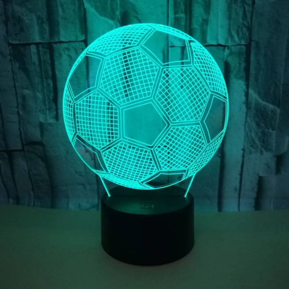 3D football night light with acrylic panel on ABS base, showing colourful projection.