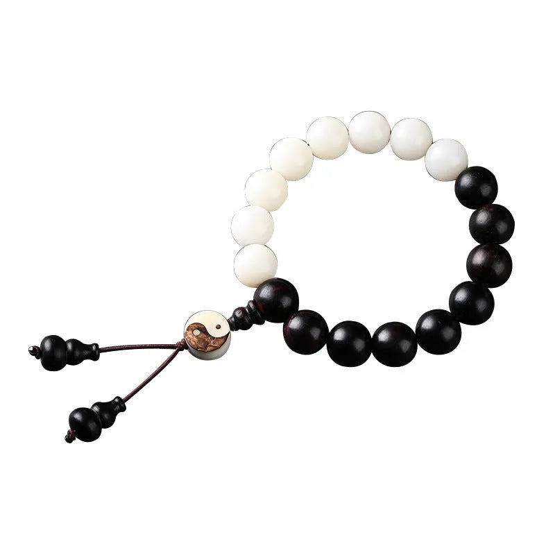 Handmade bodhi seed bracelet with 11mm mixed yuan beads including white palm seeds and carved blackwood elements
