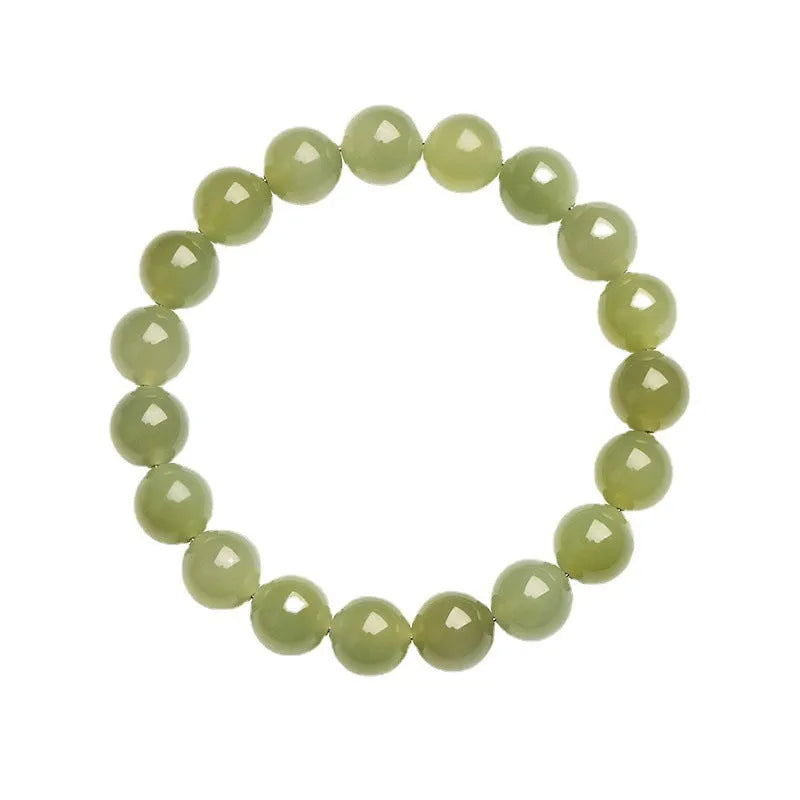 Polished Hetian jade ball bracelet in ice-like clear colour on a white background.
