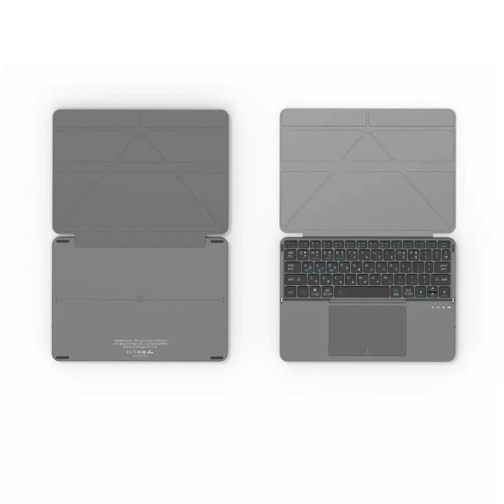 Grey wireless Bluetooth folding keyboard for mobile phones and tablets showing collapsed portable design