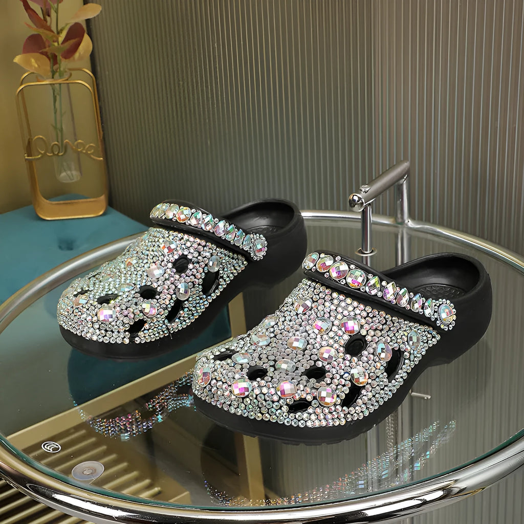 Black platform sandals for women with rhinestone detail on an EVA upper and sole.