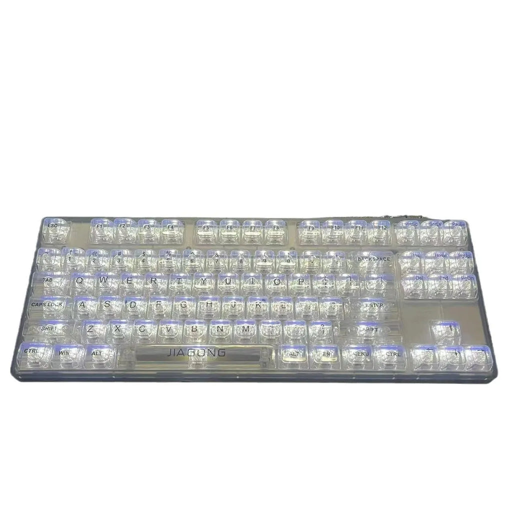 Transparent plastic mechanical keyboard key cap set with 132 pieces arranged for full keyboard coverage