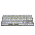 Transparent plastic mechanical keyboard key cap set with 132 pieces arranged for full keyboard coverage
