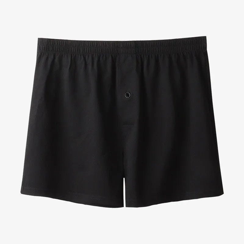 Men's loose fit pure cotton boxer shorts in black, light grey, and navy blue.