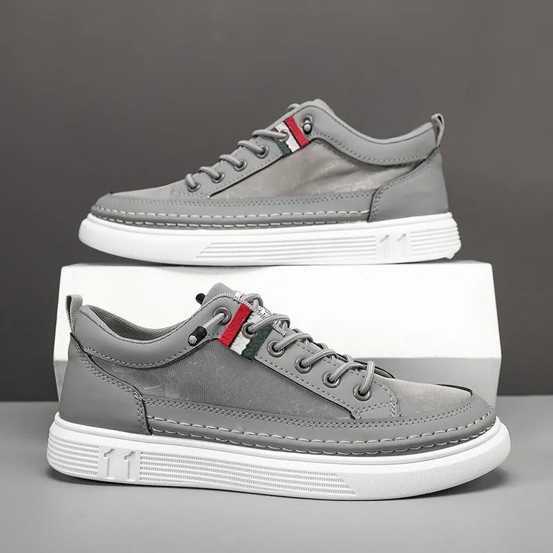 Men's casual high-top sneakers in grey with round toe and PVC sole.