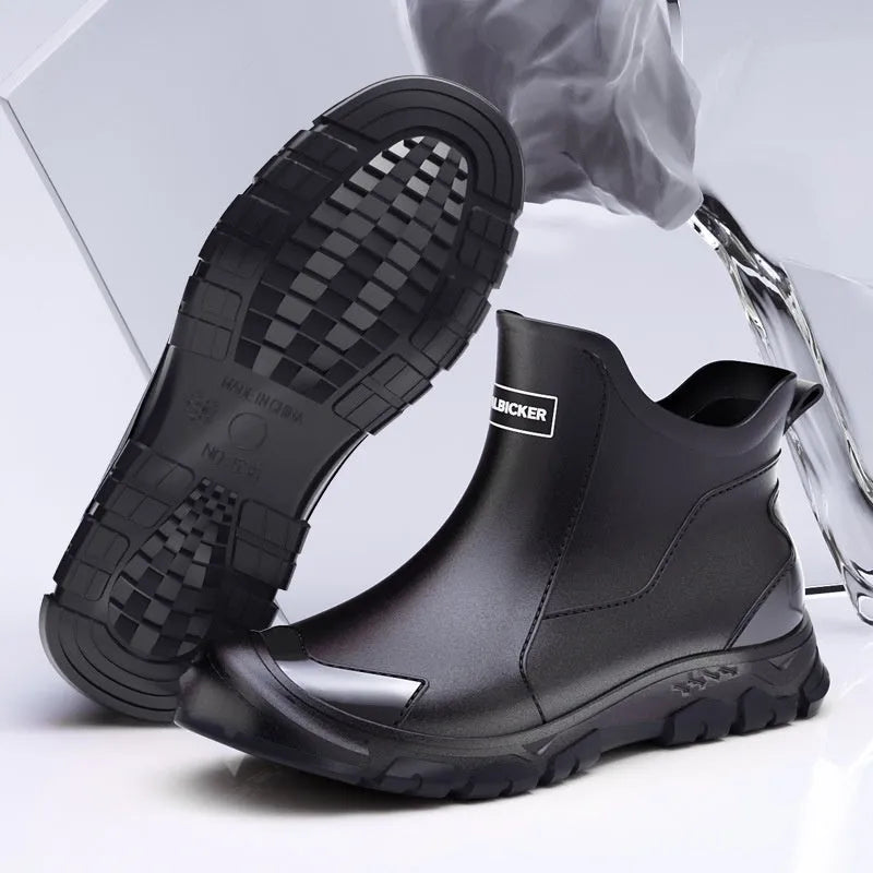 Short tube PVC rain boots with round toe and non-slip sole, shown in black and beige colour options.