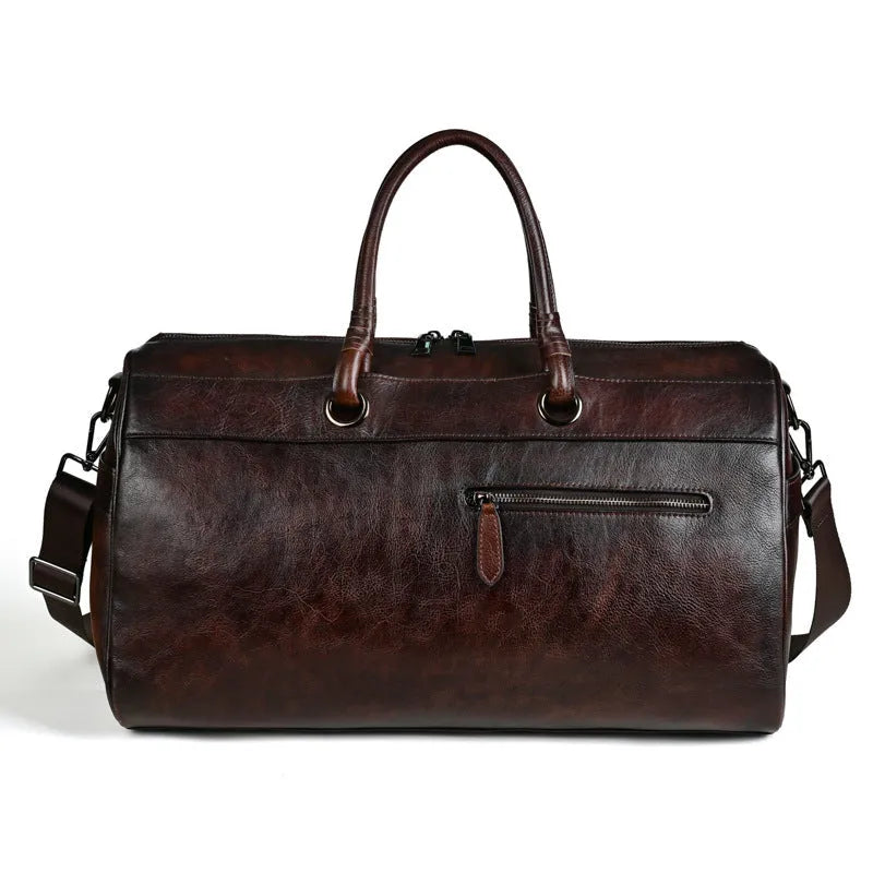Handmade retro brown leather satchel with large capacity and an expandable design.
