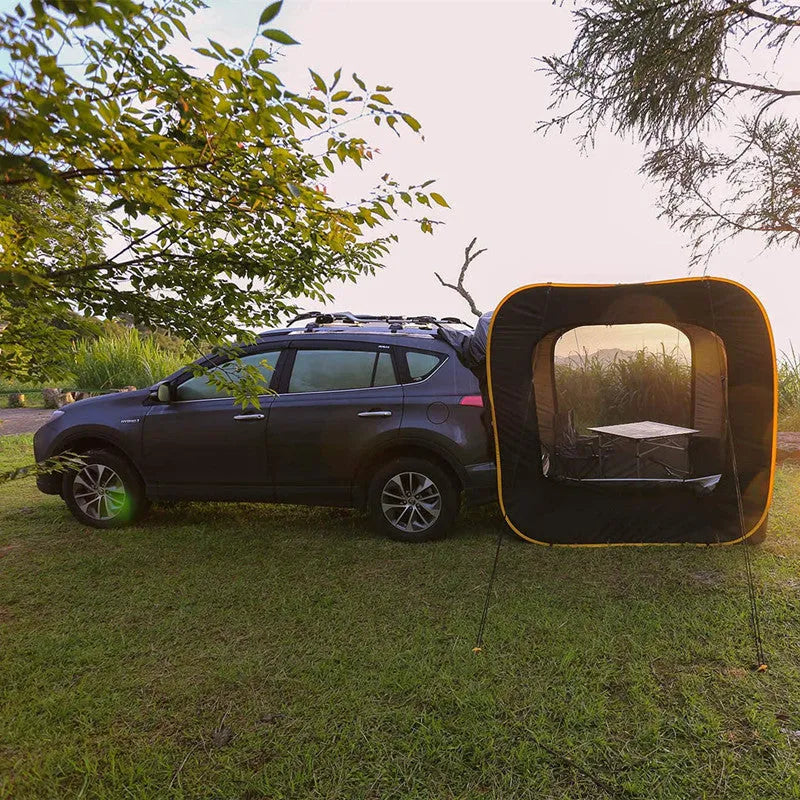 Black pop-up car tailgate tent unfolded to 200cm, showing quick-throw design and optional steel support rods.