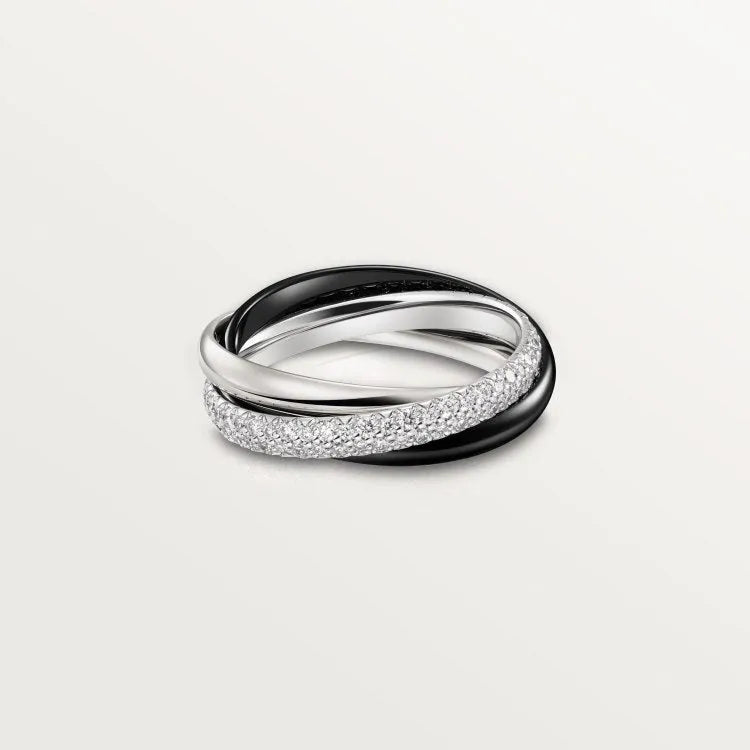 Sterling silver geometric U-shape couple ring with diamond setting on a hand.
