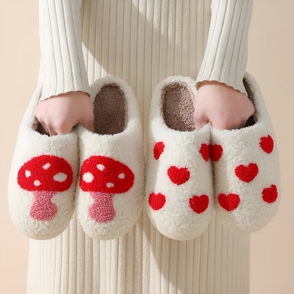 Adult women's plush cartoon-style home slippers with non-slip PVC soles in multiple colour options.