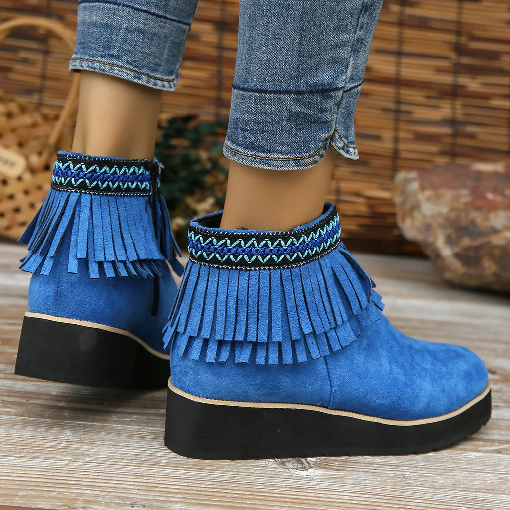 Dark brown suede women's wedge ankle boots with side zip and tassel on a waterproof platform sole.