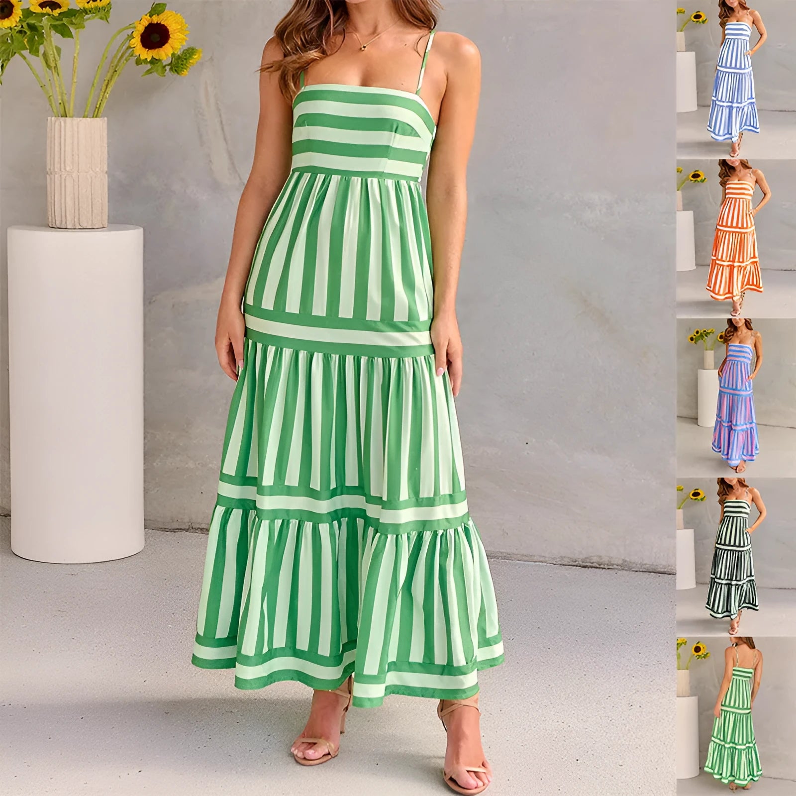 Women's long striped suspender dress with an open back and pockets on a beach