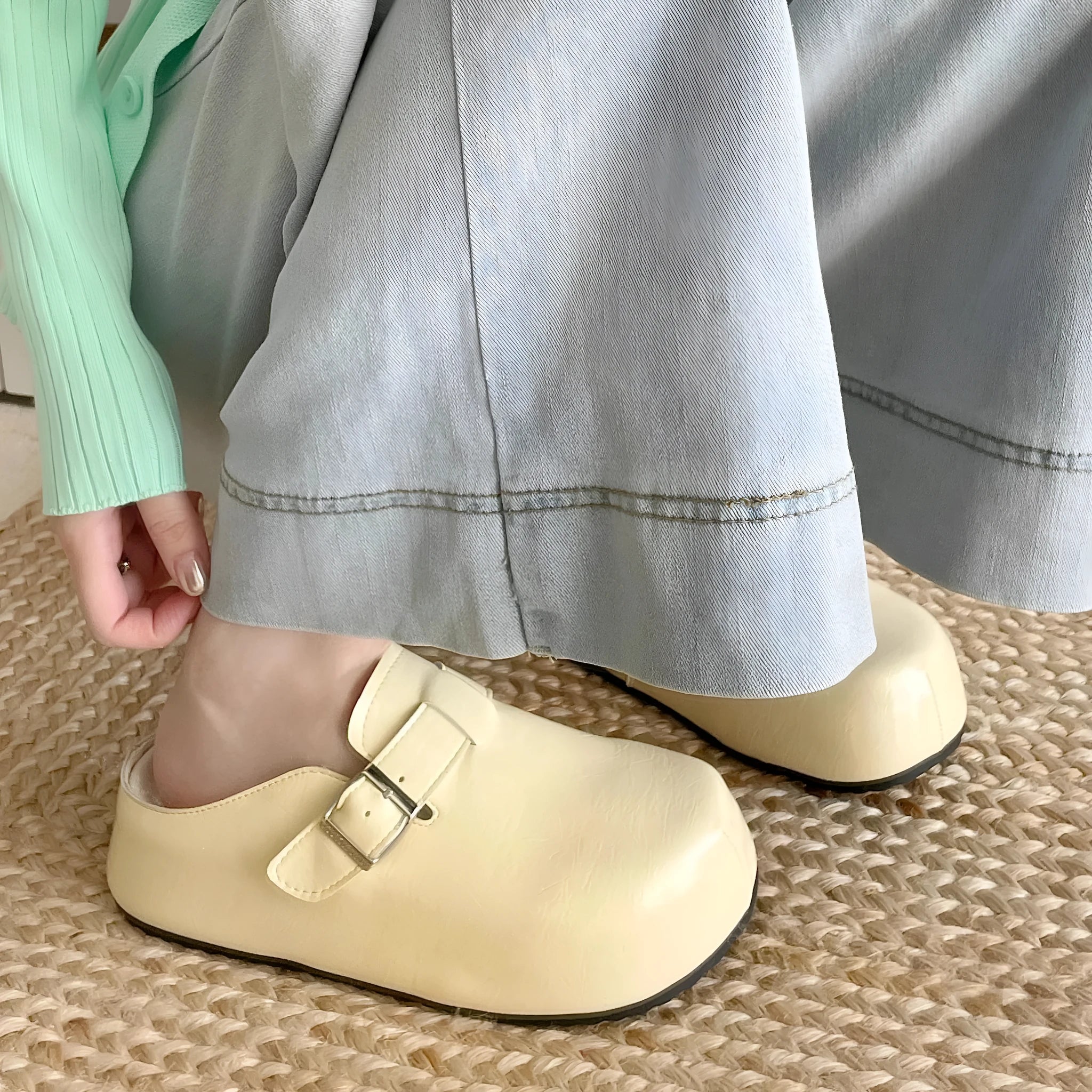 Flat casual sneakers with a buckle fastening and round toe in multiple colour options.