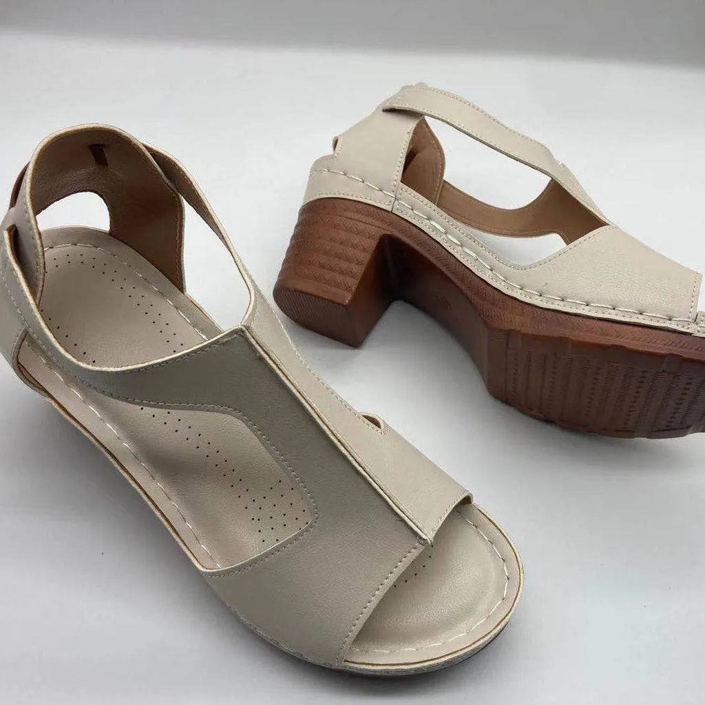 Women's plus size peep toe wedge sandals with Roman straps and a buckle in light brown.