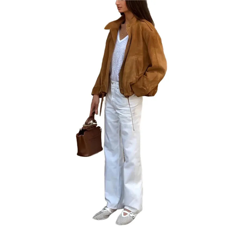 Men's solid colour retro jacket with long sleeves in a loose fit on a hanger.