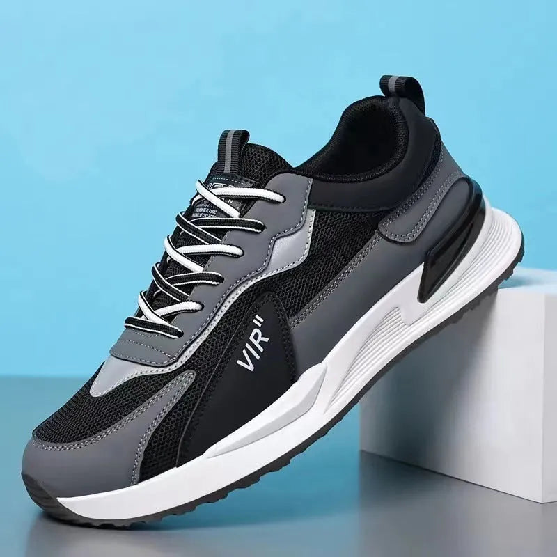 Men's colour block mesh sneakers in grey with lace-up front and low-top design.
