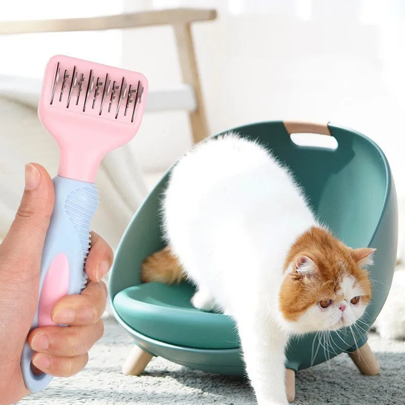 Stainless steel pet grooming comb with knot removal blade and massage tips in pink colour