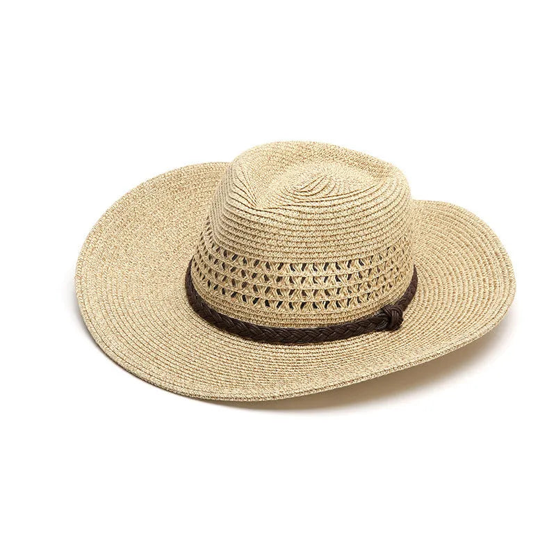 Men's foldable wide brim straw sun hat in beige, shown in a travel context.