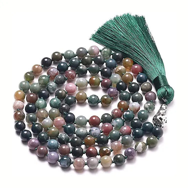 Long multi-stone agate and amethyst tassel necklace with blue pattern, geometric beads.