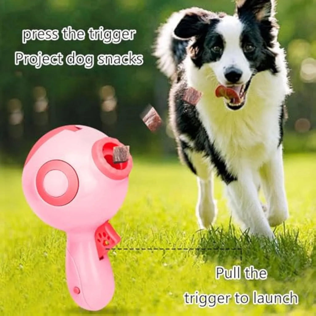 Green orange pink dog treat launcher toy for interactive feeding and training play