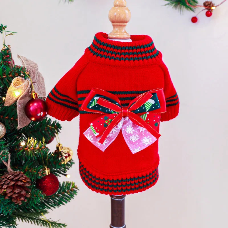 Red Christmas-themed dog jumper with festive pattern on small breed dog
