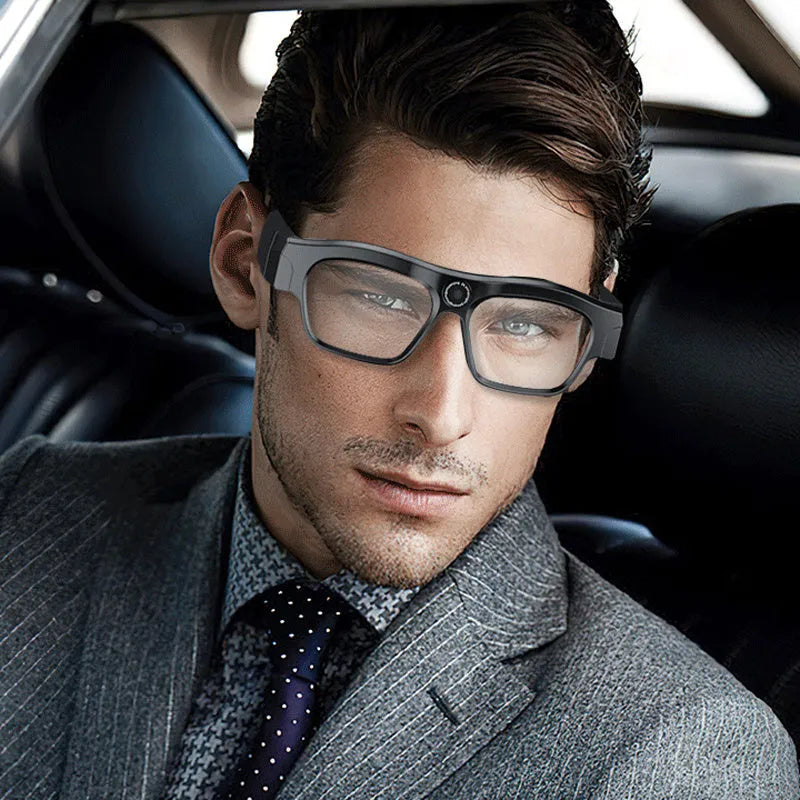 Black smart Bluetooth glasses with transparent lenses and head-mounted design for video recording