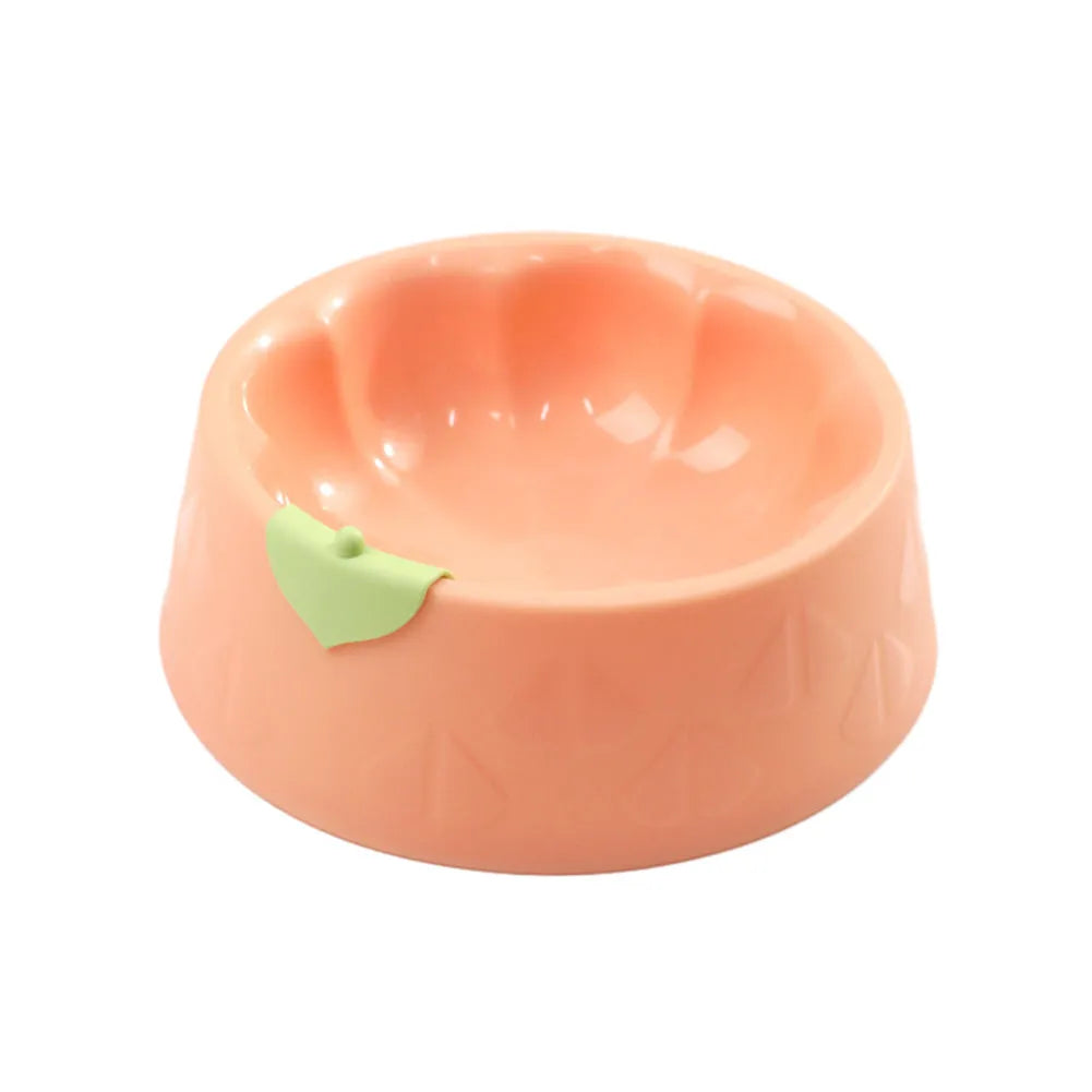 Green flower-shaped plastic pet bowl for cat or small dog food and water.