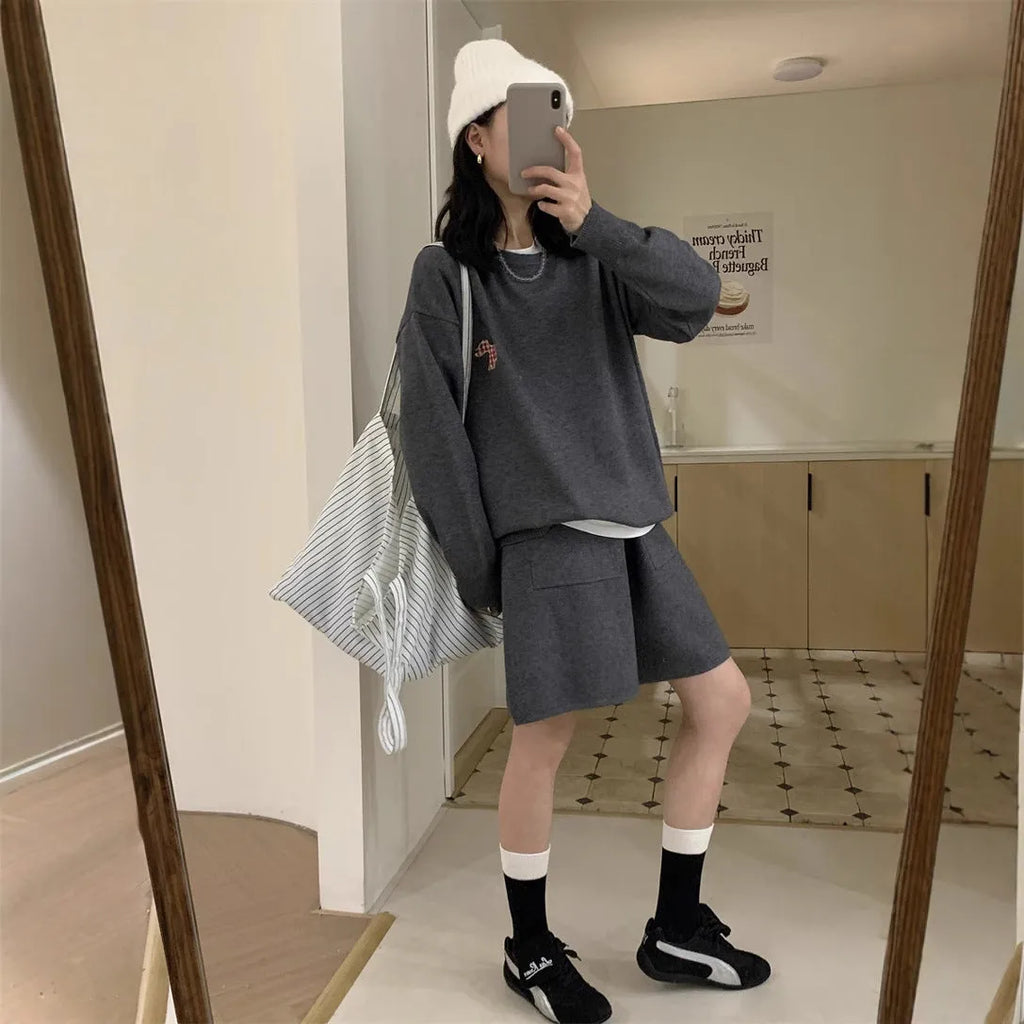 Women's milk blue casual knitted sweater and shorts suit with animal pattern embroidery.