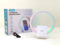 White rectangular smart Bluetooth speaker with wireless charging pad and ambient lighting