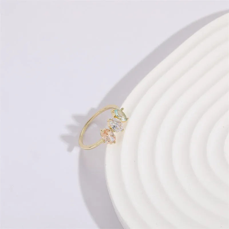Women's Mother's Day birthstone ring with geometric triangle design and horse eye tricolor zircon stones