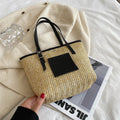 Women's straw woven shoulder bag in European retro style with sewn detailing and three-dimensional pockets