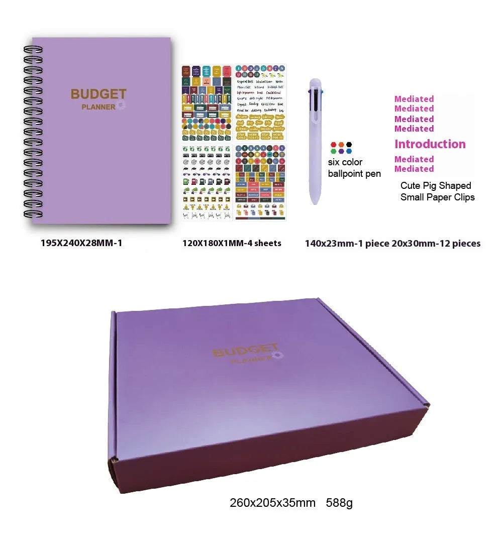 Purple coil-bound financial planning notebook with pen and stickers on a desk.