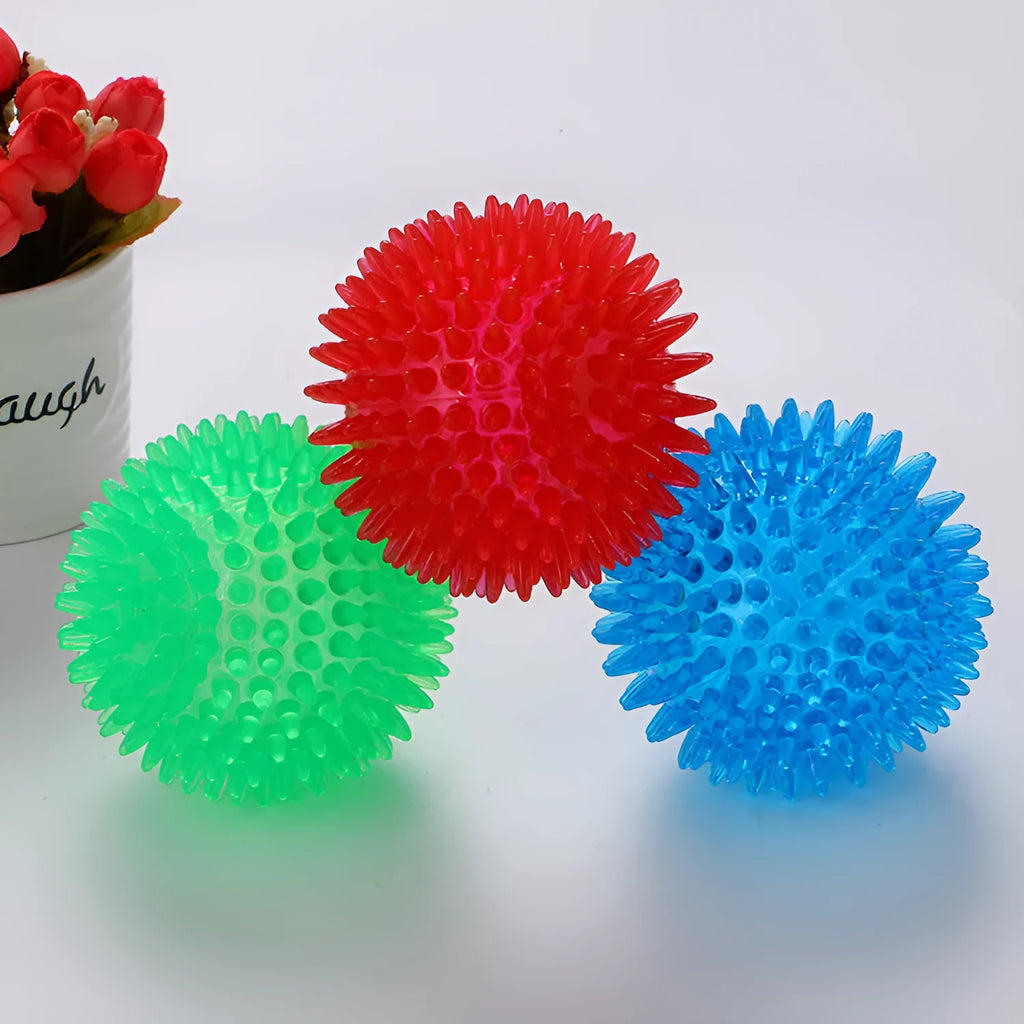 TPR spiky ball dog toy, 100g, in red, green, and blue for biting and sounding play