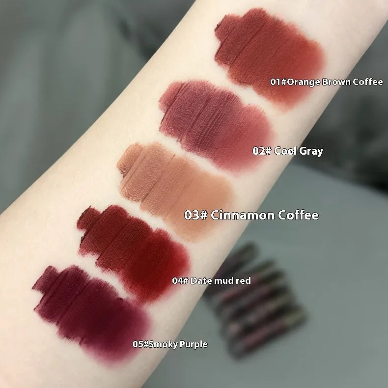 Lava Secret Matte Lip Mud Lipstick in 5 shades showing orange brown coffee, cool grey, cinnamon coffee, jujube red and smoked purple colours