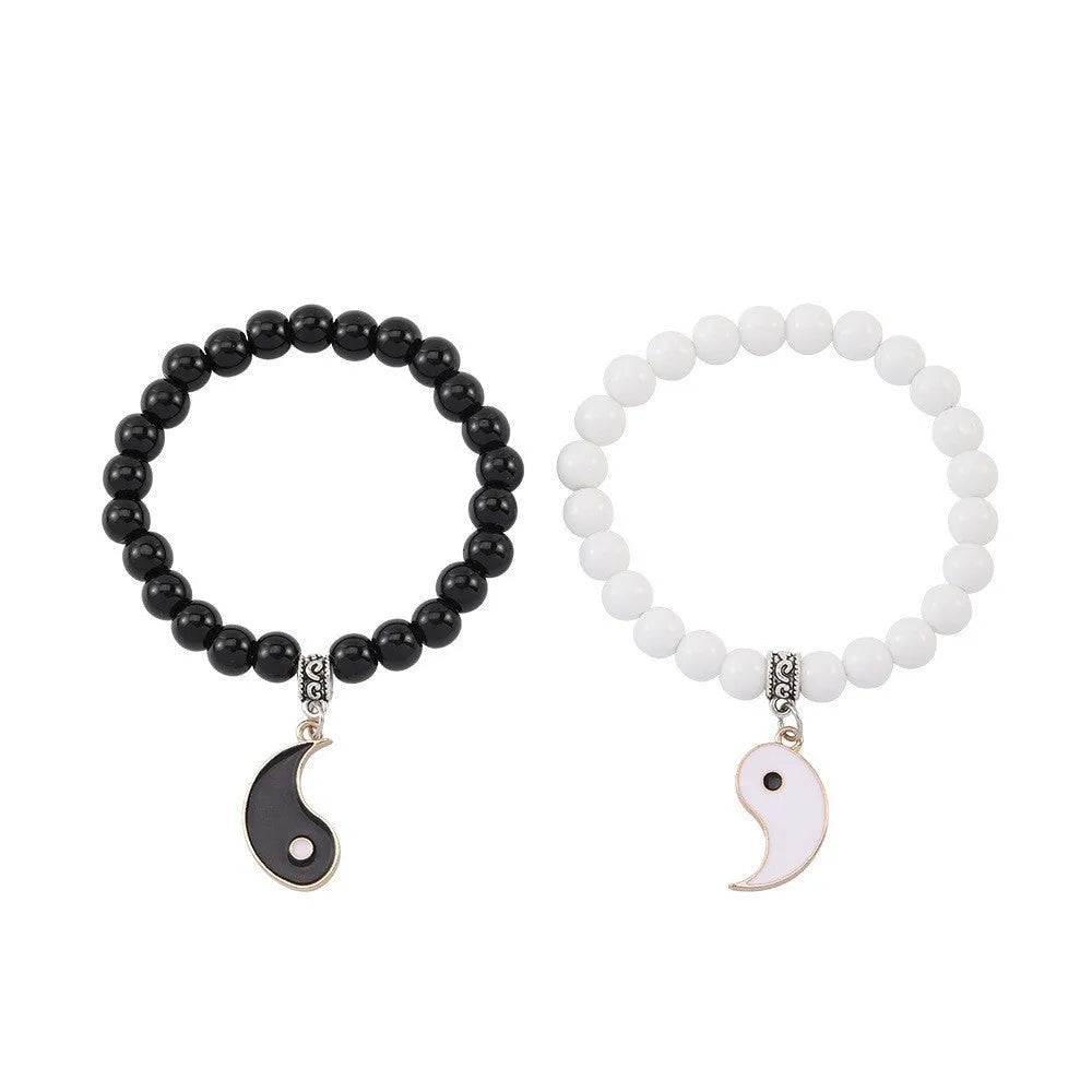 Geometric eight-diagram shaped alloy bracelet with an electroplated finish.