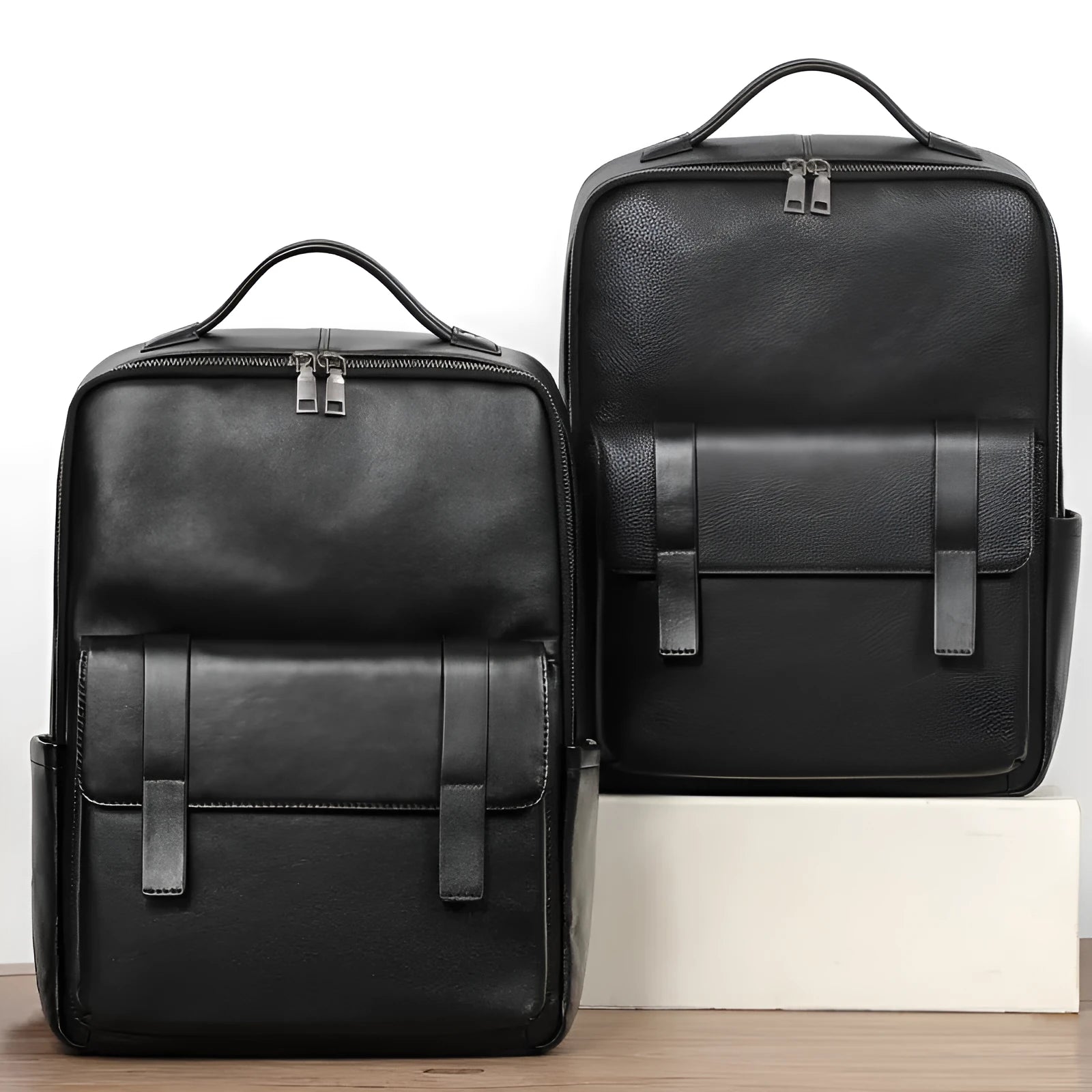 Men's black genuine leather computer backpack with weaving detail and large 36-55L capacity.