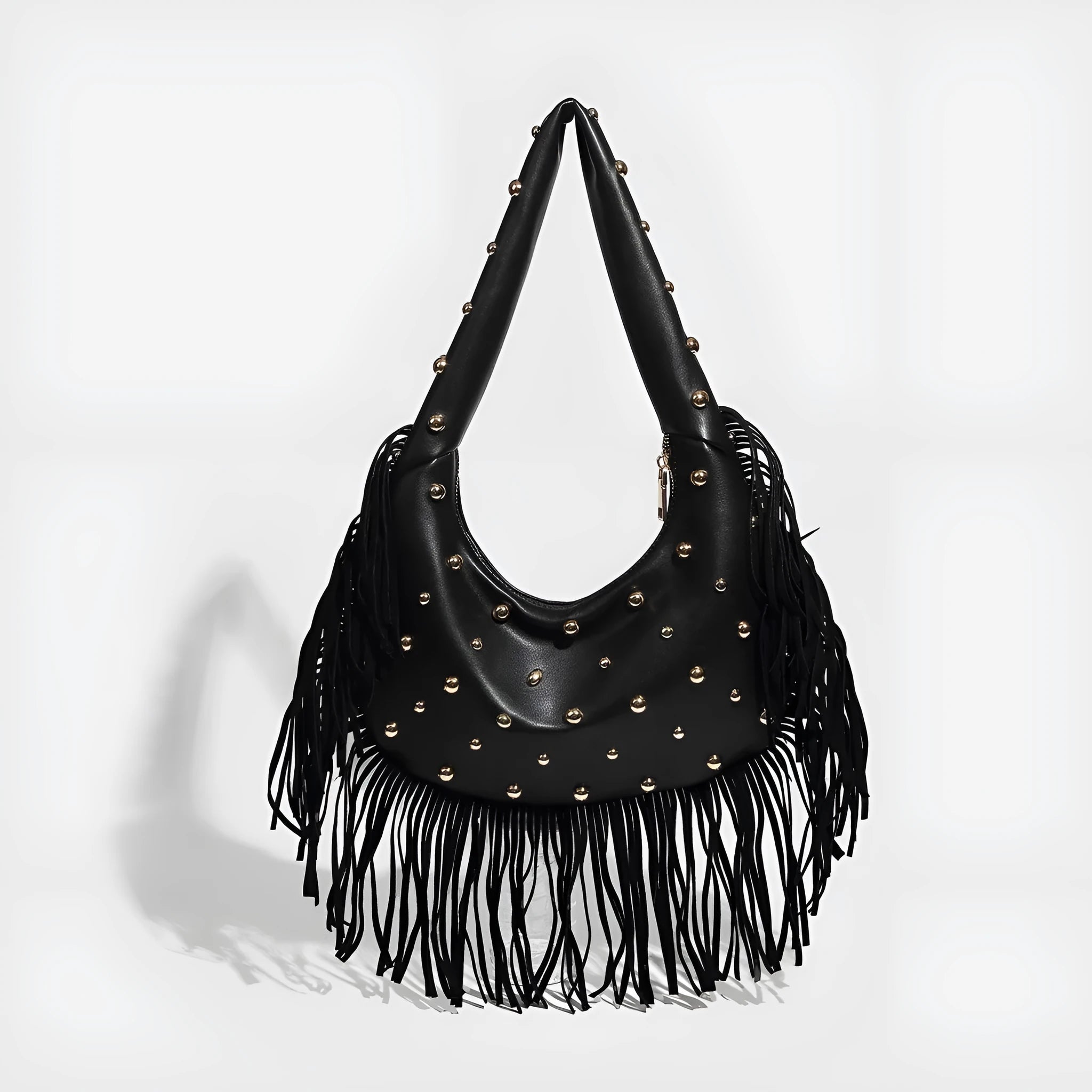 Retro black shoulder handbag with tassel detail and internal mobile phone pocket.
