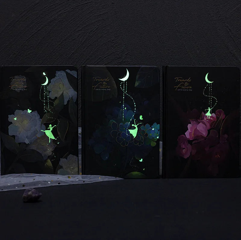 A5 notebook with luminous cover and colour-illustrated pages in four colour options