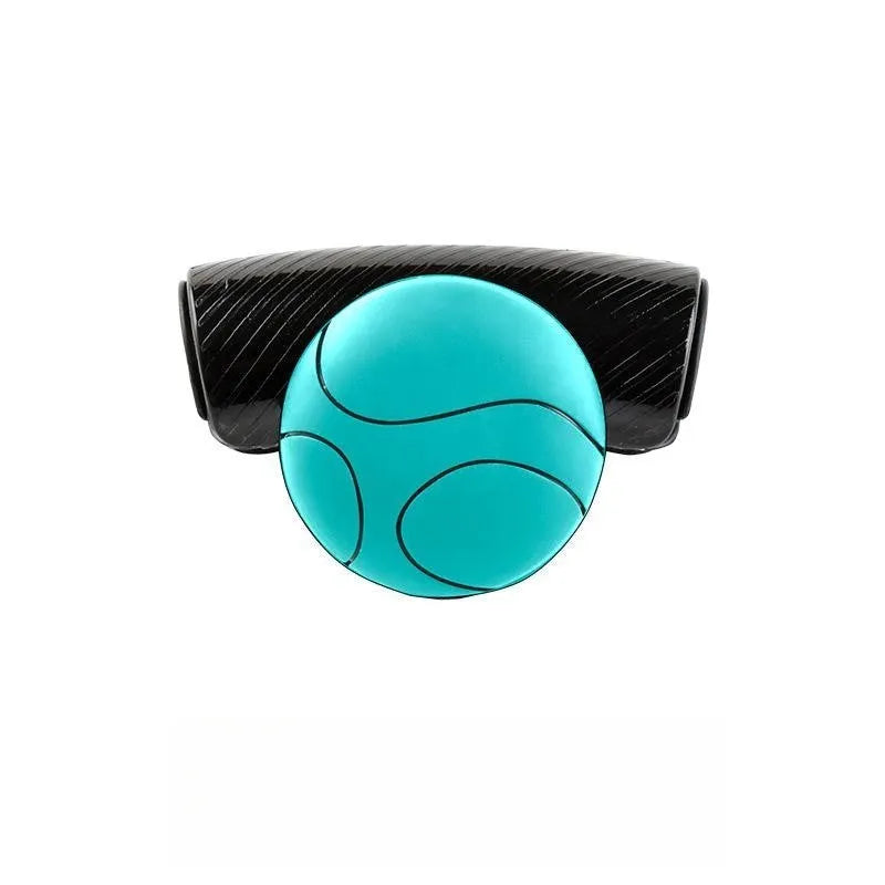 Black and blue silicone steering wheel assist ball with metal bearing booster measuring 9x6cm