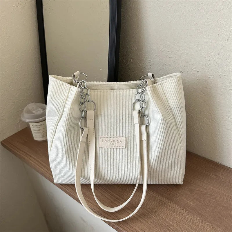 Corduroy tote handbag for women showing large capacity design and one-shoulder strap