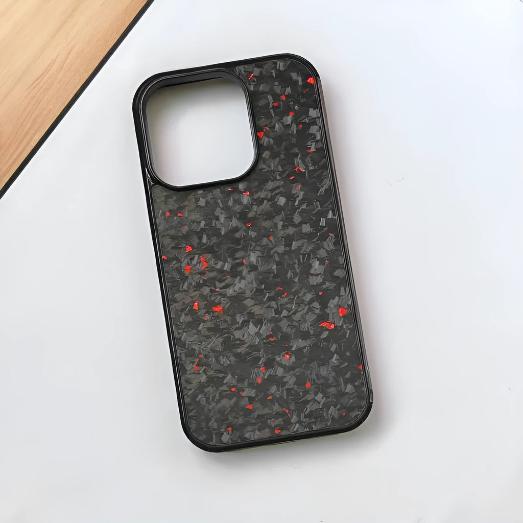 Carbon fibre iPhone case with gold foil forged grain finish, magnetic suction, and all-inclusive shockproof design.