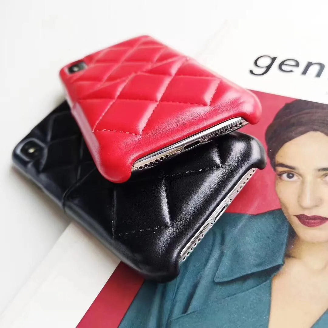 Black leather mobile phone case for iPhone XS Max on a table